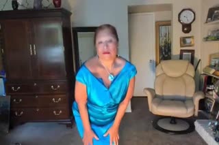 mature Latine woman dancing striptease & masturbating