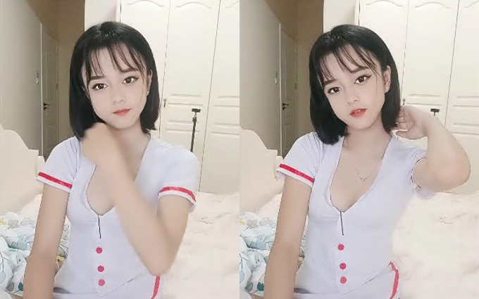 18超清纯短发卡哇伊萌妹情趣护士装白丝袜